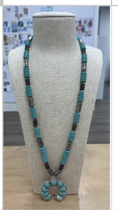 Turquoise flat bead squash blossom necklace